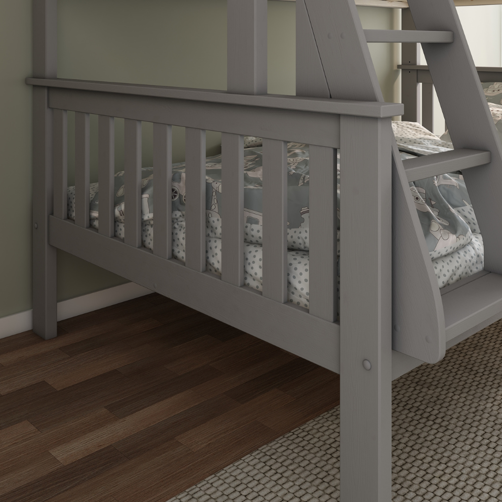 Grey wooden bunk bed with a ladder in a room with wooden flooring and a light-colored wall.