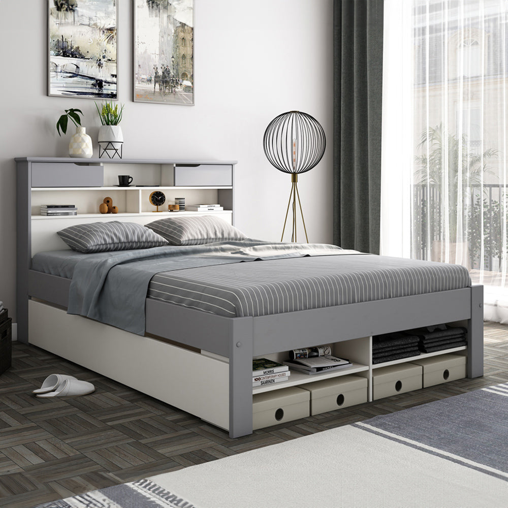 Grey bed with storage drawers in a modern bedroom setting