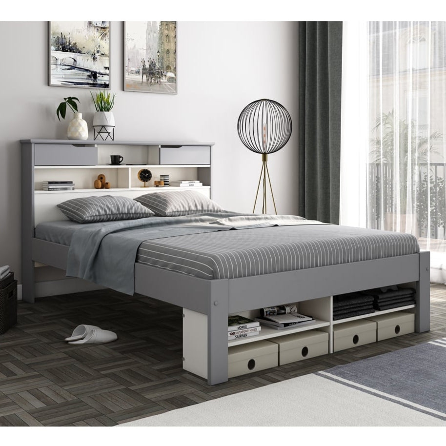 Grey bed with storage drawers in a modern bedroom setting