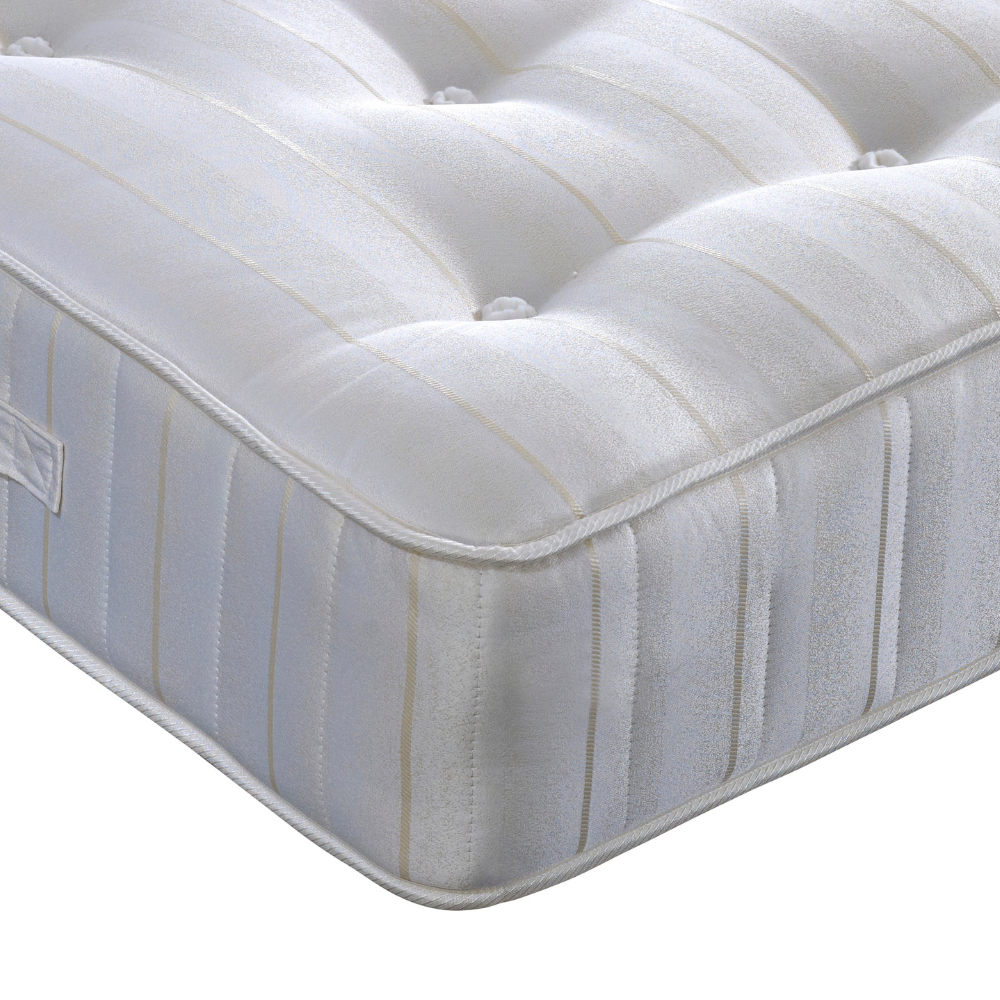 White mattress with striped pattern on a white background