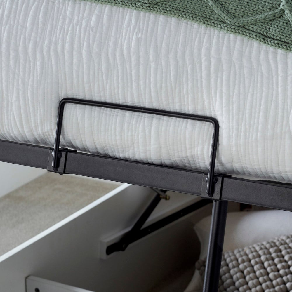 Bed base showing a black metal support structure.