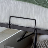 Bed base showing a black metal support structure.