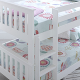 White bunk bed with floral-patterned bedding in a child's room.
