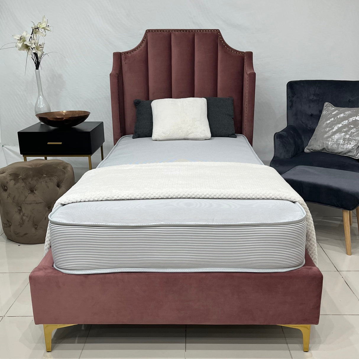Savoy contract mattress on a bed. 