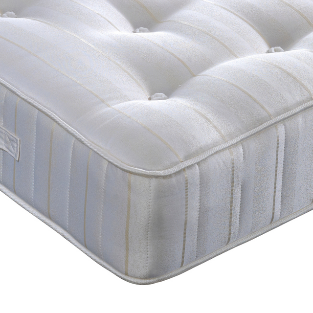 White mattress with striped pattern on a white background